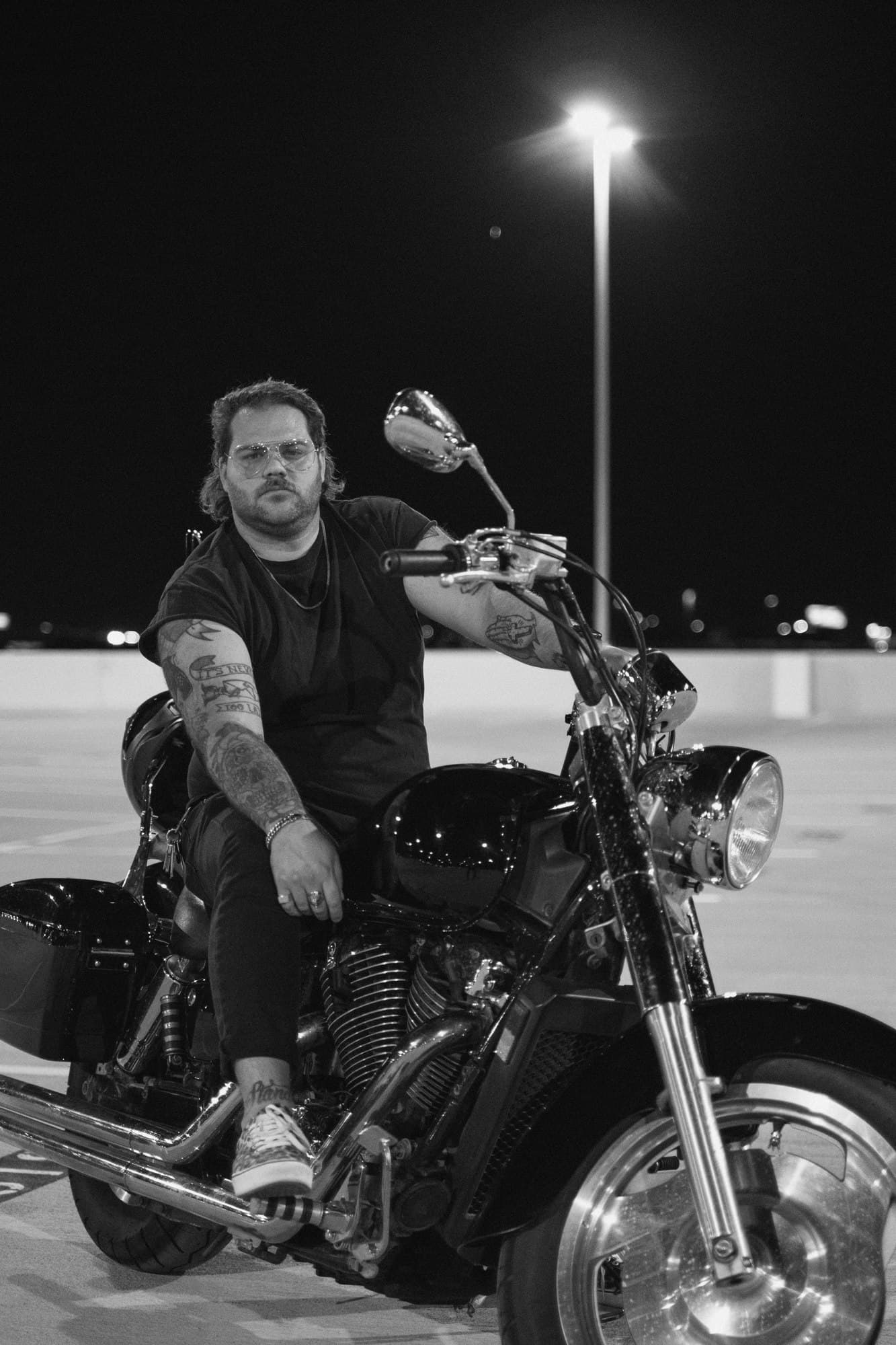 Taylor Anderson on a motorcycle at night